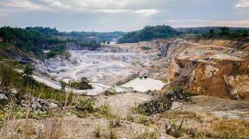 The view of a quarry with dirt and rocks photo