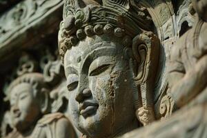 Ancient stone carving of buddha showing spiritual serenity photo