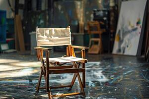 Wooden director chair sitting in art studio with sunlight shining through window photo