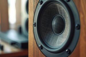 Powerful audio speaker vibrating creating sound waves in a music studio photo