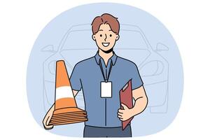Man instructor from driving school smiles and holds traffic cones inviting to take exam for license vector