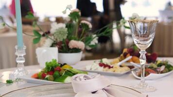 Festive table setting on a wedding table creates an elegant and romantic atmosphere video