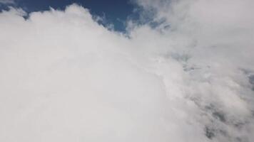 HD. Aerial shooting. Flight in the clouds and the sun in the sky. Amazing flight through the clouds with beautiful light on an FPV drone video