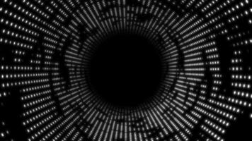 White and Black color glowing circular dots halftone design hi-tech loop able 3D tunnel on black background video