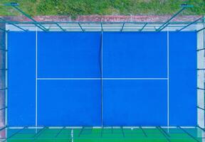 Aerial view with drone, overhead shot of a paddle tennis courts photo