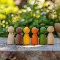 Wooden figures in a cheerful outdoor setting with colorful natural backdrop photo
