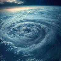 High-altitude view of a massive rotating cyclone over the ocean with swirling clouds and powerful winds photo