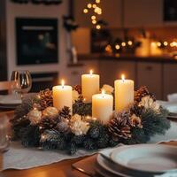 Cozy Christmas table centerpiece with glowing candles, pine cones, and festive greenery, creating a warm holiday atmosphere photo