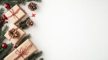 Minimalist Merry Christmas and Happy New Year greeting card or web banner with Christmas gift boxes, pine branches, pinecones and copy space for text arranged on a white background for festive decor photo