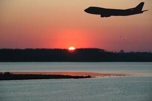 Sunset and plane photo