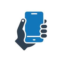 Hand holding a smartphone icon on a white background vector