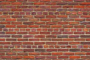 Old red brick wall. Abstract interior background. photo