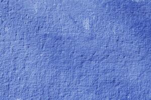 Texture of rough blue plaster. Architectural abstract background. photo