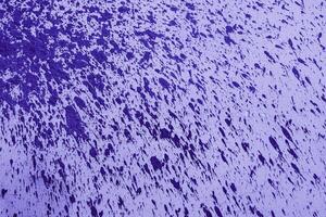 Texture of rough violet plaster. Architectural abstract background. photo