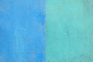 Texture of rough blue plaster. Architectural abstract background. photo