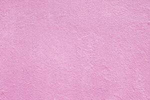Texture of rough pink plaster. Architectural abstract background. photo