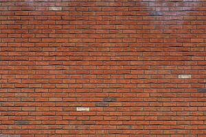 Old red brick wall. Abstract interior background. photo