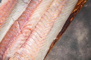 fillet raw white fish cod or halibut fresh meal food snack on the table copy space food background rustic top view photo