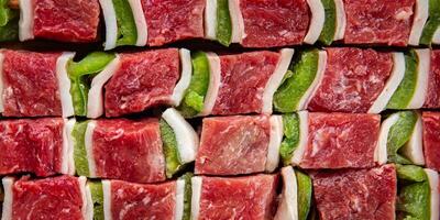 kebab raw meat vegetable pork, lard, pepper, vegetable dish fresh delicious gourmet food background on the table rustic food top view copy space photo