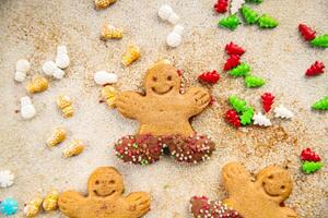 Gingerbread man ginger cookies christmas party delicious dessert christmas treat fresh delicious gourmet food background on the table rustic copy space top view photo
