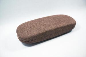 brown reading glasses case, to protect the glasses when not in use. photo