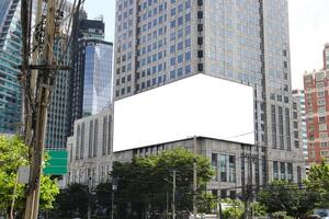 Mockup image of Blank billboard white screen posters and led outside building for advertising, Building Billboard Mockup photo