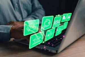 Climate change,hand hold hologram to save energy,and reduce global warming,ecology friendly investment,ESG environment social governance,Green Business Innovation and Sustainable Development concept. photo
