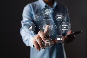 Man touch icon ai and use smartphone, Marketers education, research, analyze media streaming content creation and online marketing strategies to grow their digital business. photo