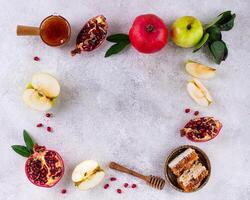 Rosh Hashana concept with honey, apple and pomegranate photo
