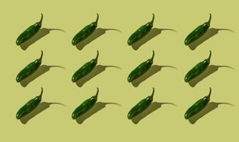 Pepper on green background, isolated, pattern photo