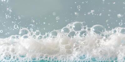 Foam with bubbles background. Soap, shampoo, powder, gel for shave, foam mousse with bubbles template. Pattern for hygiene, clean wash with copy space photo