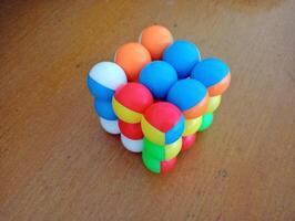 A colorful set of balls on a table photo