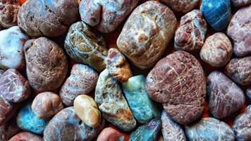 A pile of rocks with different colors and shapes photo