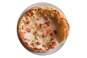 flatbread topped with sesame seeds on a white plate isolated on transparent background png
