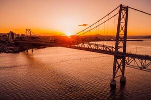Hercilio luz bridge with sunset in Florianopolis. Drone view photo