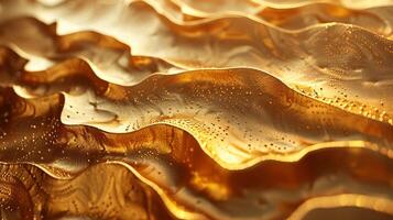 Golden waves on a surface with water droplets photo