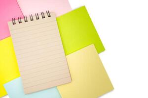 Blank paper note on blank colorful sticky note isolated on white background. Copy space. photo