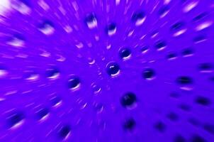 Close up of water droplets on dark blue cover background with zoom in effect photo