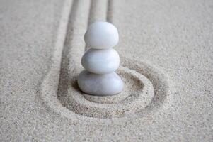 White Zen stones on circles formation with customizable space for text photo