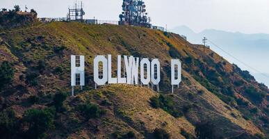 Aerial View of Hollywood Sign with Distant Mountains in Los Angeles photo