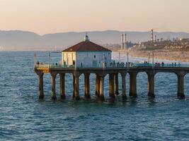 Manhattan Beach Pier Extending into Pacific Ocean in Late Afternoon photo