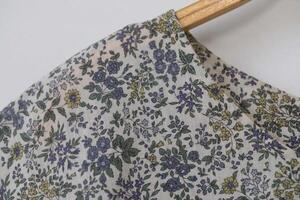 Textile pattern with floral ornament on fabric. photo