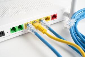 Ethernet cable with wireless router connect to internet service provider internet network. photo