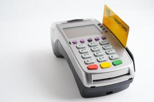 Payment POS terminal isolated on white background with colpy space, technology for finance and shopping business. photo