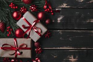 Top view photo Christmass flatlay gift boxes,red christmas tree toys and spruce brance on wooden background. Xmas backdrop with space for text.Copyspace.