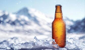 Beer bottle on ice, snowy mountains background with copy space photo