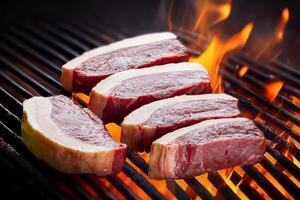 Steaks on the grill with flames photo