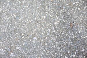 Textured Gray Asphalt Surface for Background Use photo