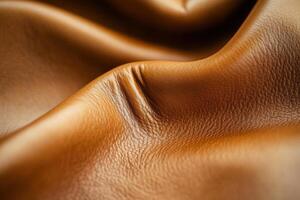 Stunning close-up of textured brown leather fabric draped elegantly in soft folds photo