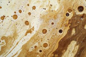 Swirling patterns of brown liquid with bubbles captured in a close-up view in natural light photo
